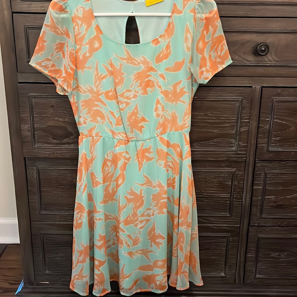 Blue and coral mini dress with open back